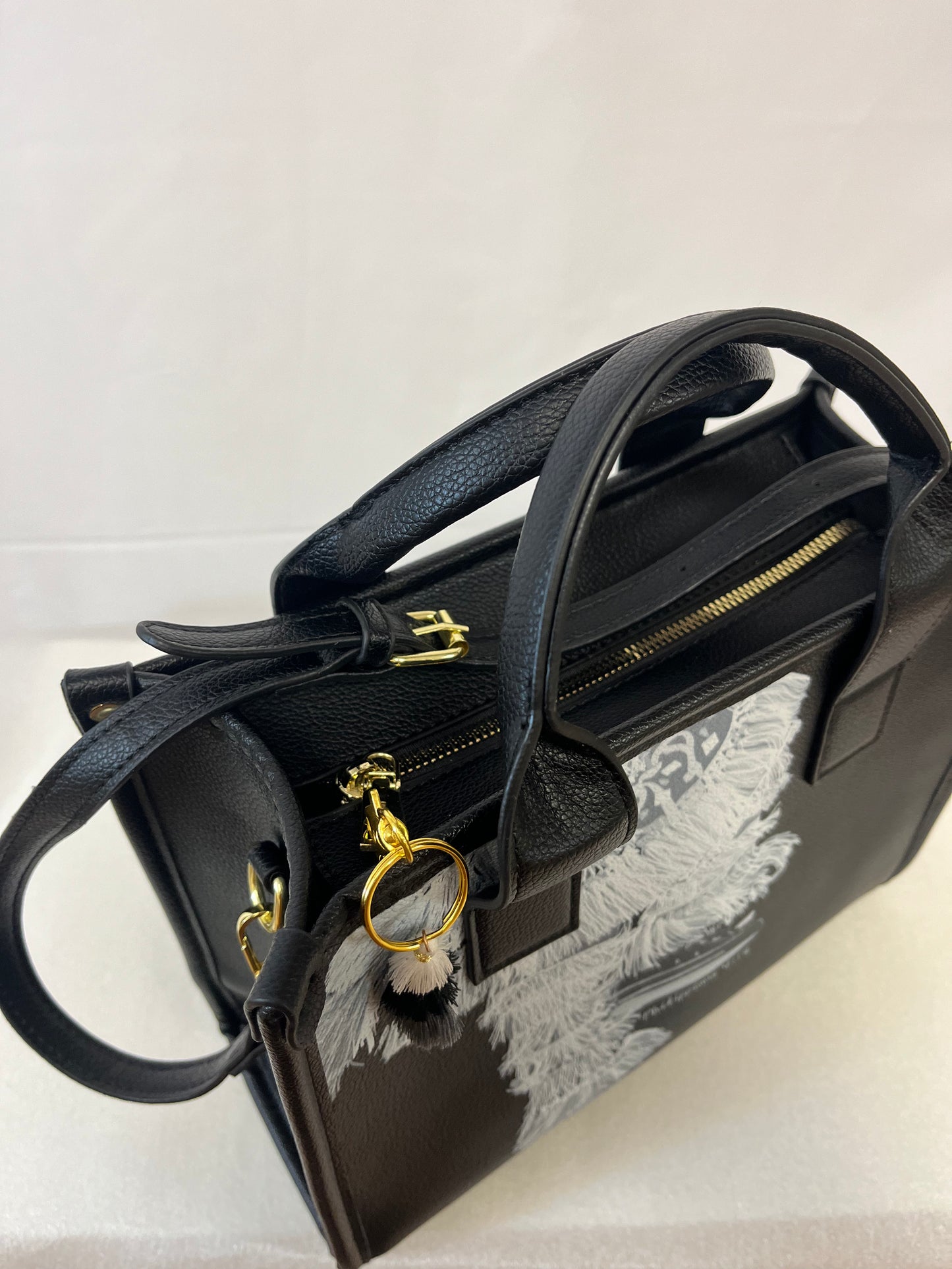 Gombey Handbag in Color Black